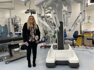 Kelly with the da Vinci robot
