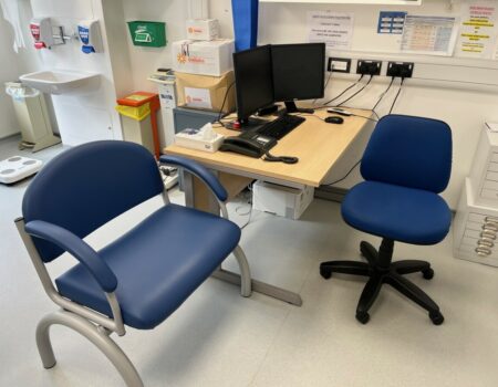 Clinic room with chair and desk