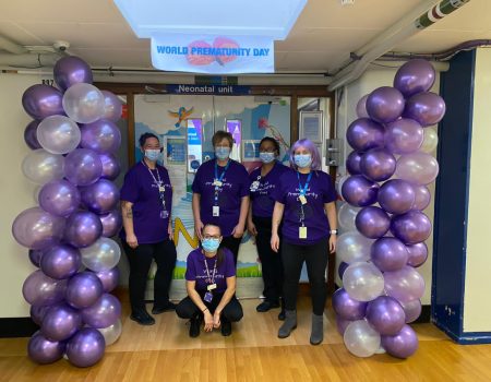 staff outside NICU during purple party