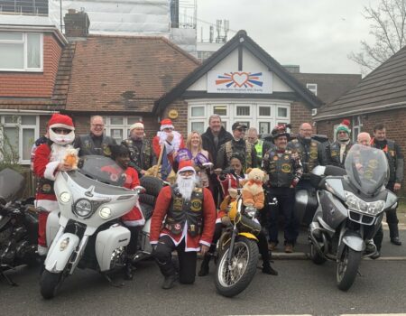 Bikers outside the charity building dressed in Santa outfits