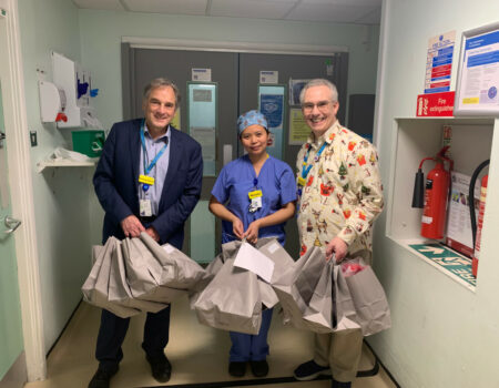 Staff receiving Christmas gifts