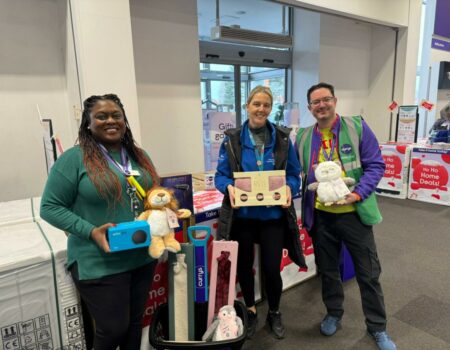 Staff receiving presents from Curry's Luton