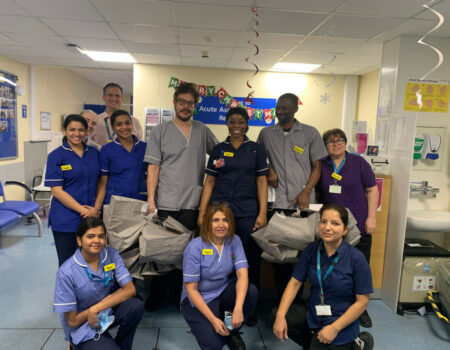 Staff receiving Christmas gifts