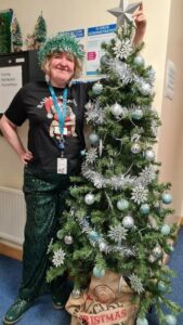 A member of library staff wearing a sparkly skirt