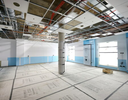 Large room interior with ceiling being added - June 2024