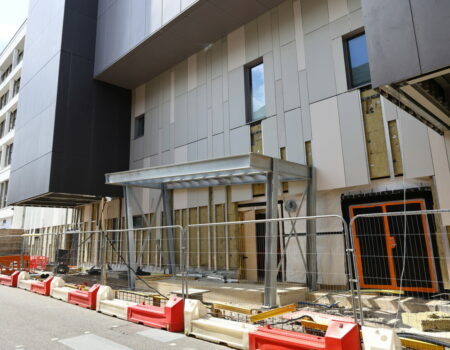 Outside entrance progress from service road - framing in place