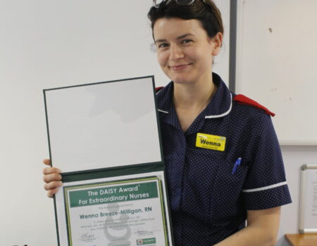 Wenna with her DAISY certificate