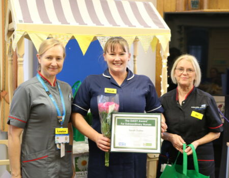 Sarah with her certificate with Louise and Bill