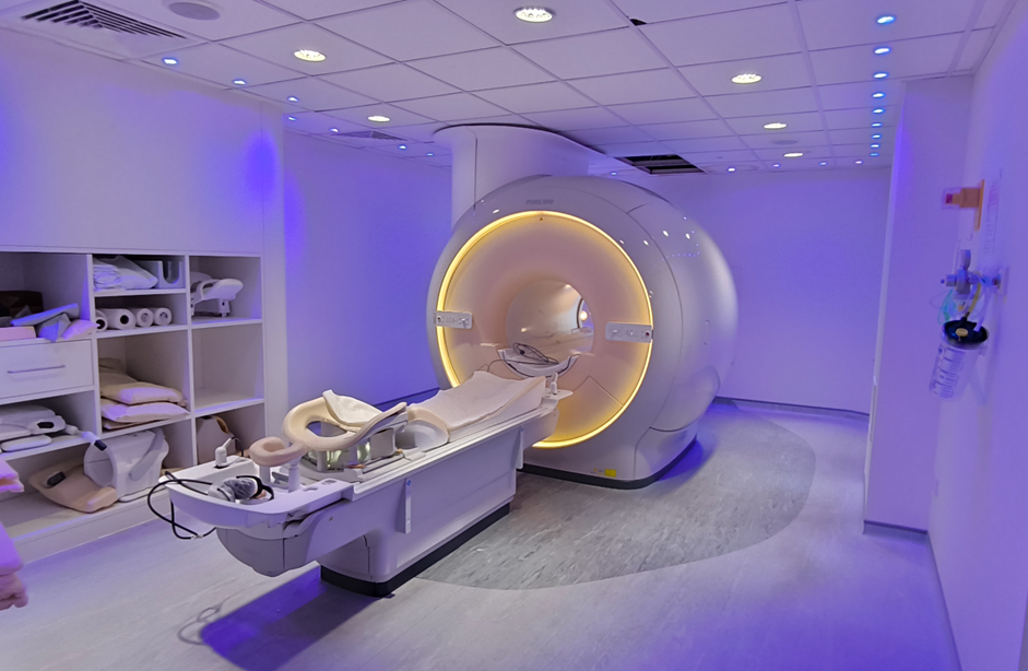 MRI Machine in a room with purple ambient lighting