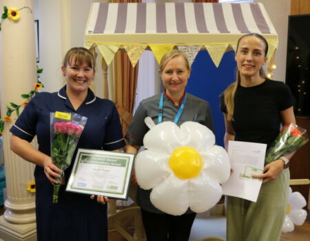 Sarah with her certificate with Louise