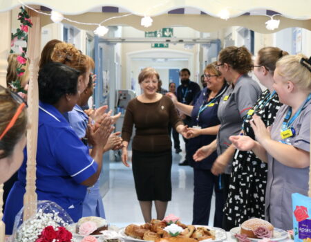 The Arnold Whitchurch team applauding Nana