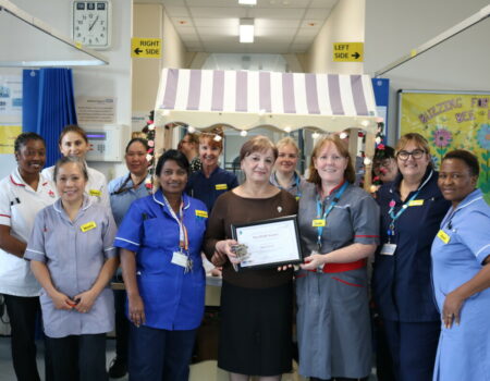 The Arnold Whitchurch team with Nana for her ROSE Award