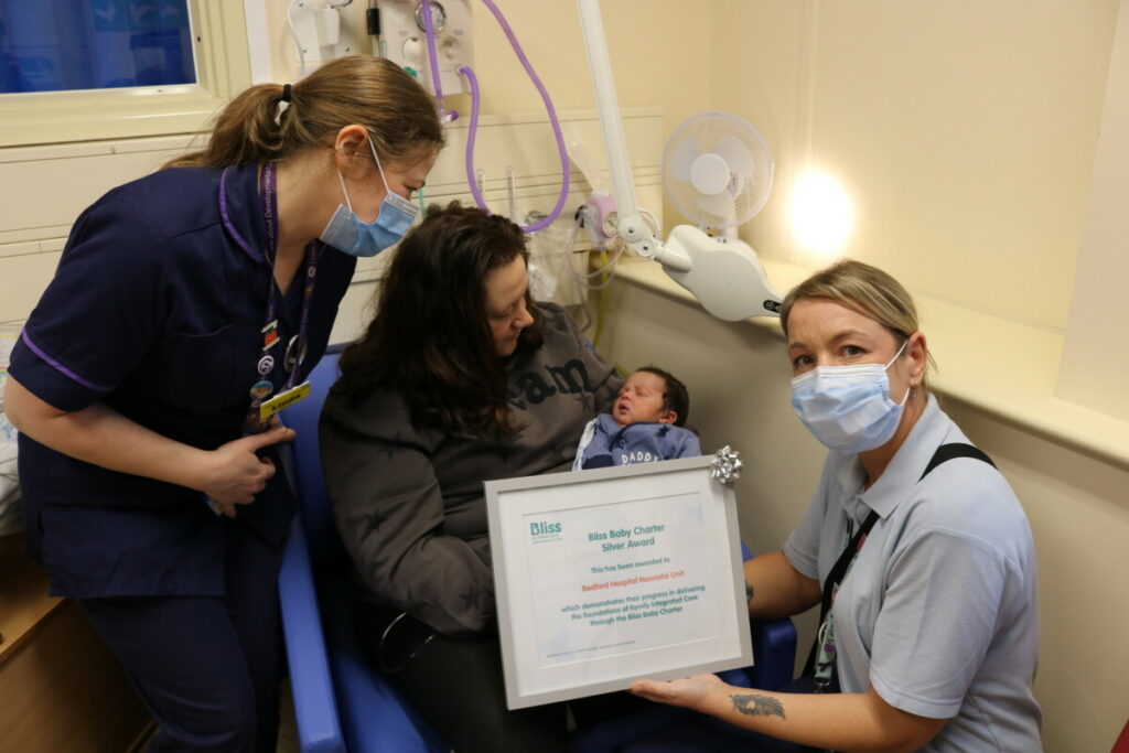 From right to left isFaye Tott - Family Integrated Care/FiCare Co-ordinator, Lauren Hall (Mummy) and baby Remmi, Linda Queijo-Ridor, Matron for Neonatal Service (Bedford Hospital) 