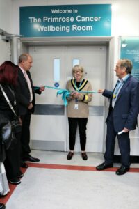 Yvette King cutting the ribbon at the opening of The Primrose Cancer Wellbeing Room